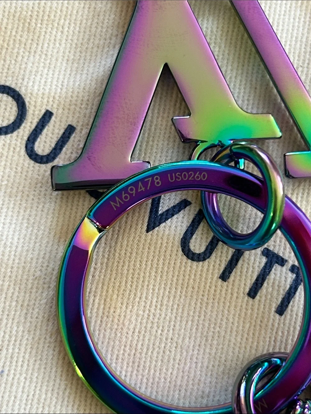 Louis Vuitton Oilslick iridescent Keychain Bag Charm M69478